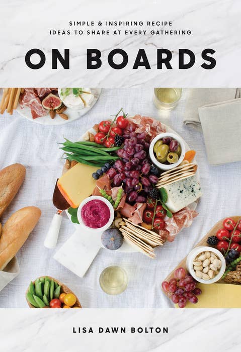 Book cover of 'On Boards' by Lisa Dawn Bolton featuring a platter of food and wine.