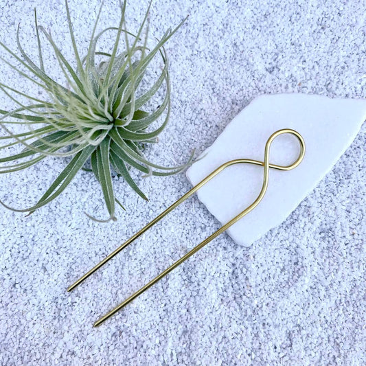 Twisted hair fork