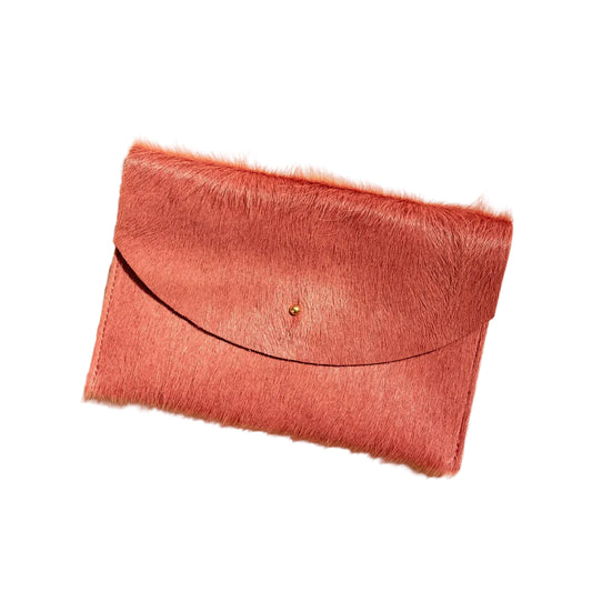 Pink clutch bag on a white background