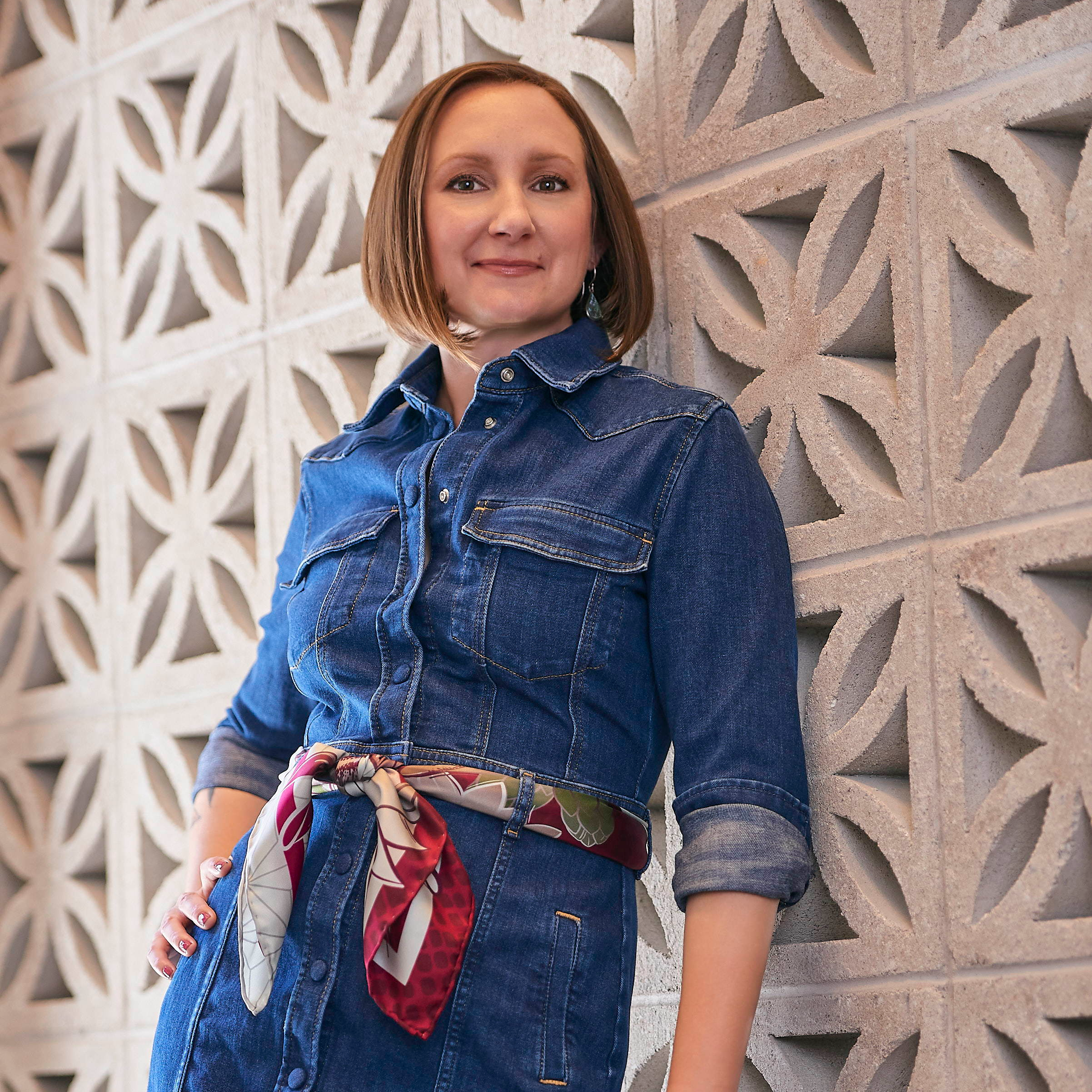 Wearing a Studio Richau silk scarf as a belt on a denim dress