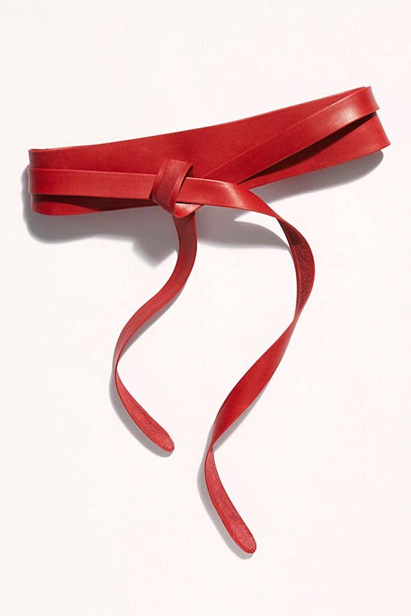 Red wrap belt tied on a white background